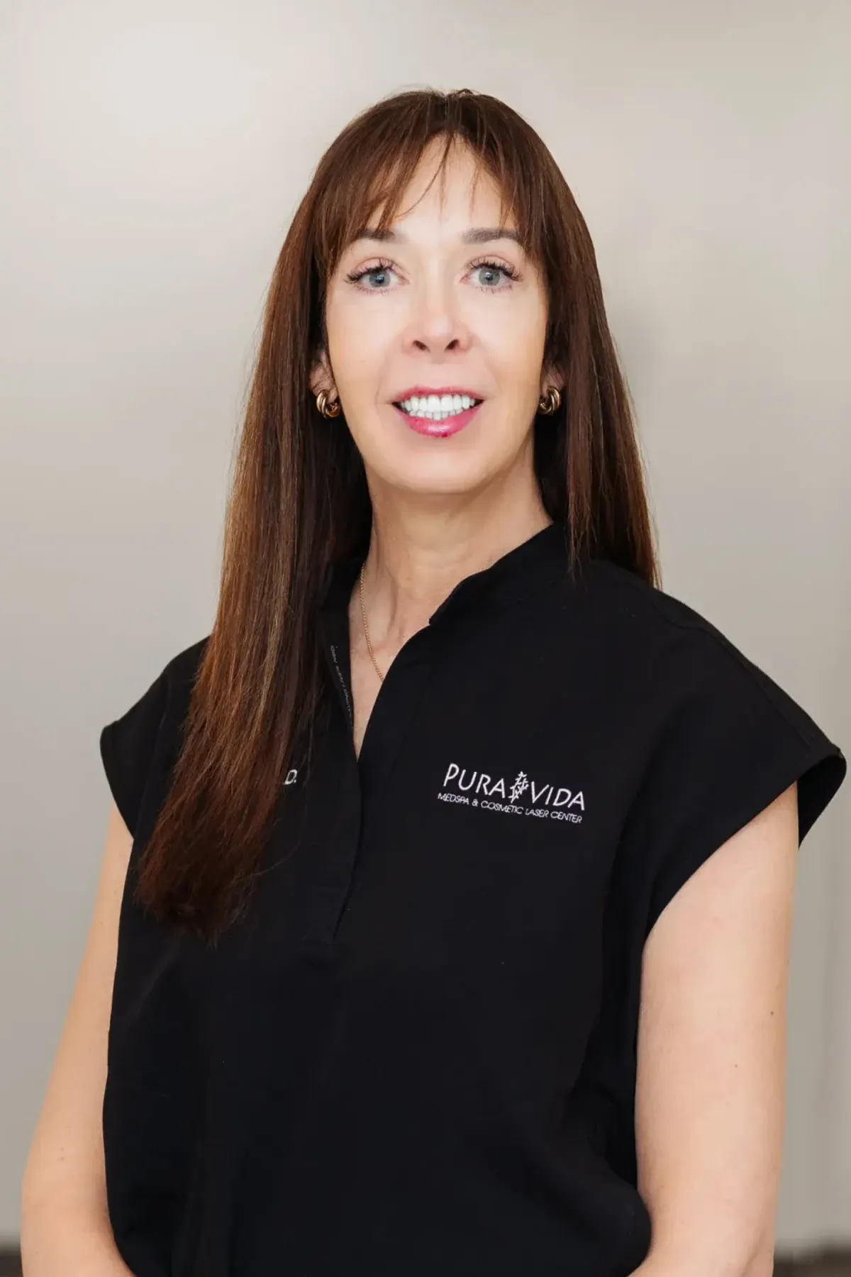 Dr. Leslie Apgar, MD, founder of Pura Vida Med Spa