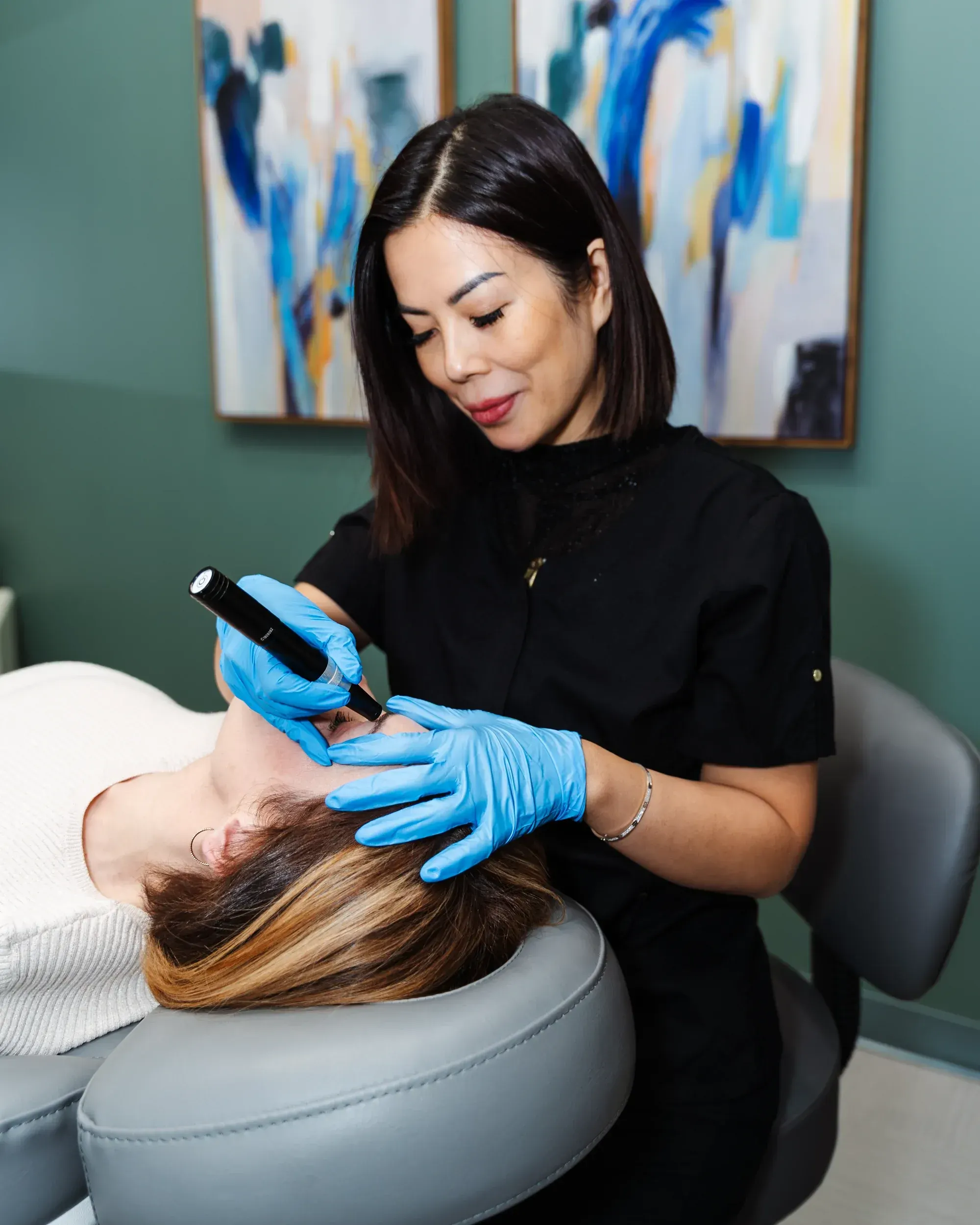 Provider explaining microneedling safety at Pura Vida Med Spa