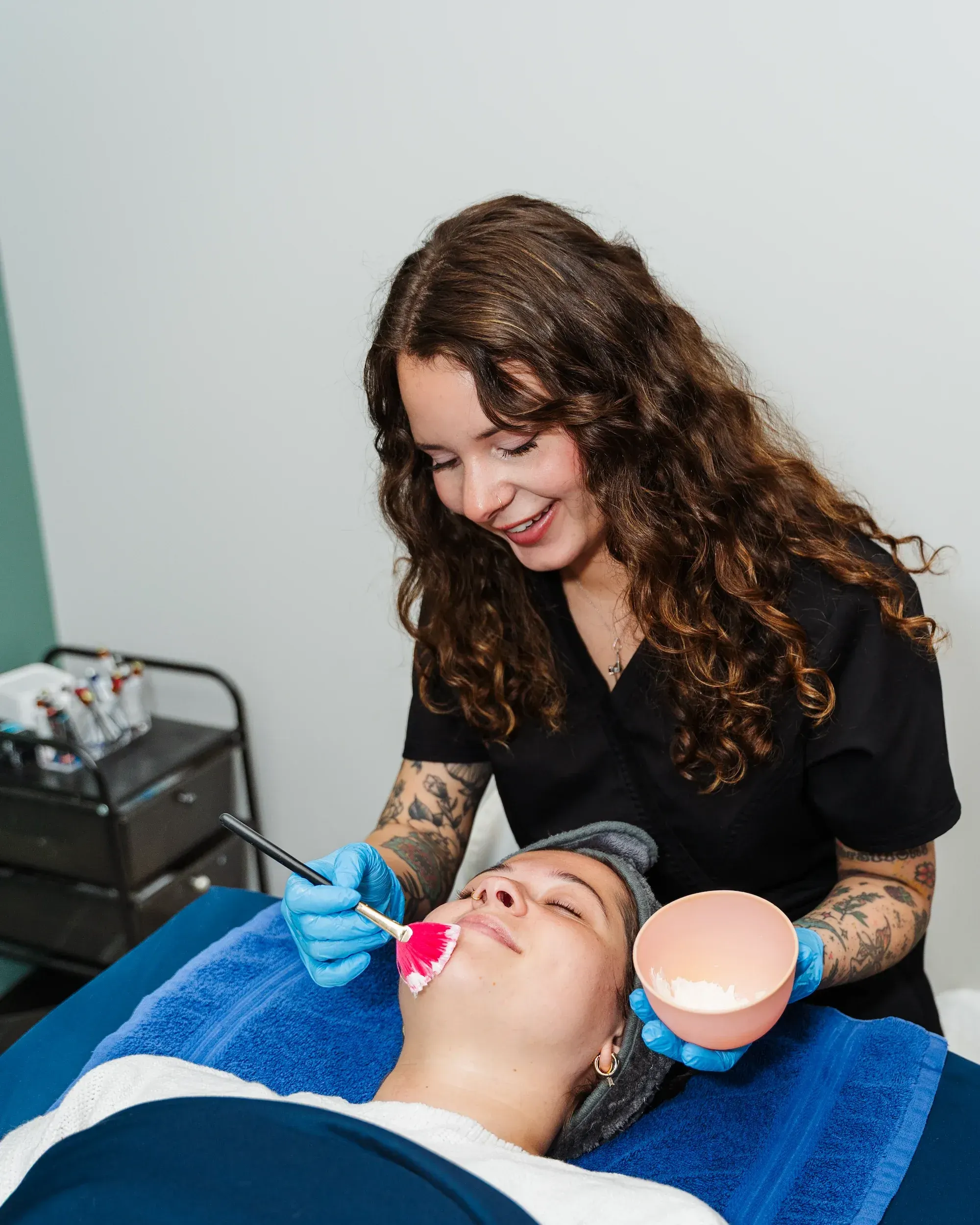 Pura Vida provider reviewing chemical peel safety information with a patient