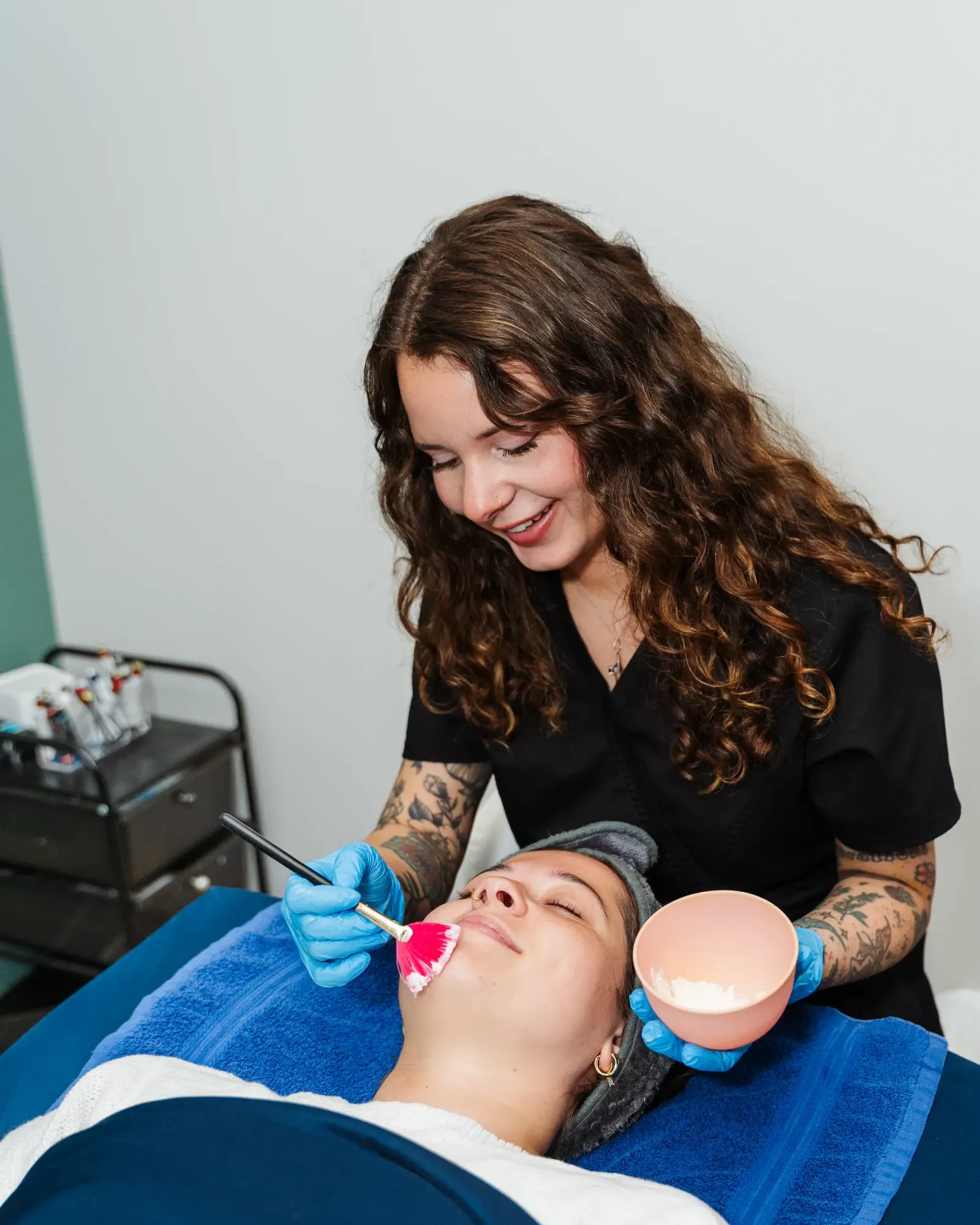 Pura Vida provider reviewing chemical peel safety information with a patient
