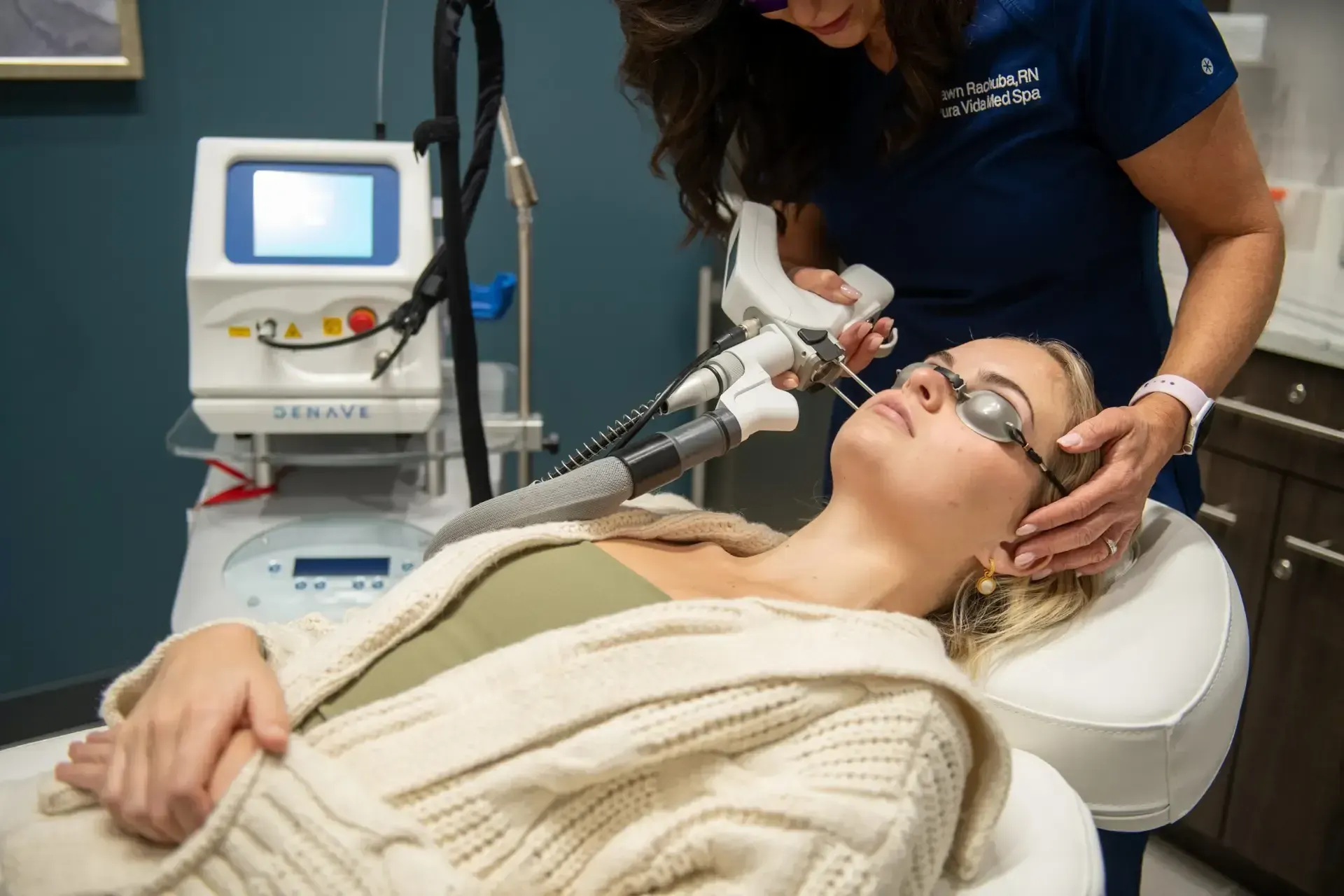 Refined woman receiving laser vein treatment at Pura Vida Med Spa in Fulton, MD