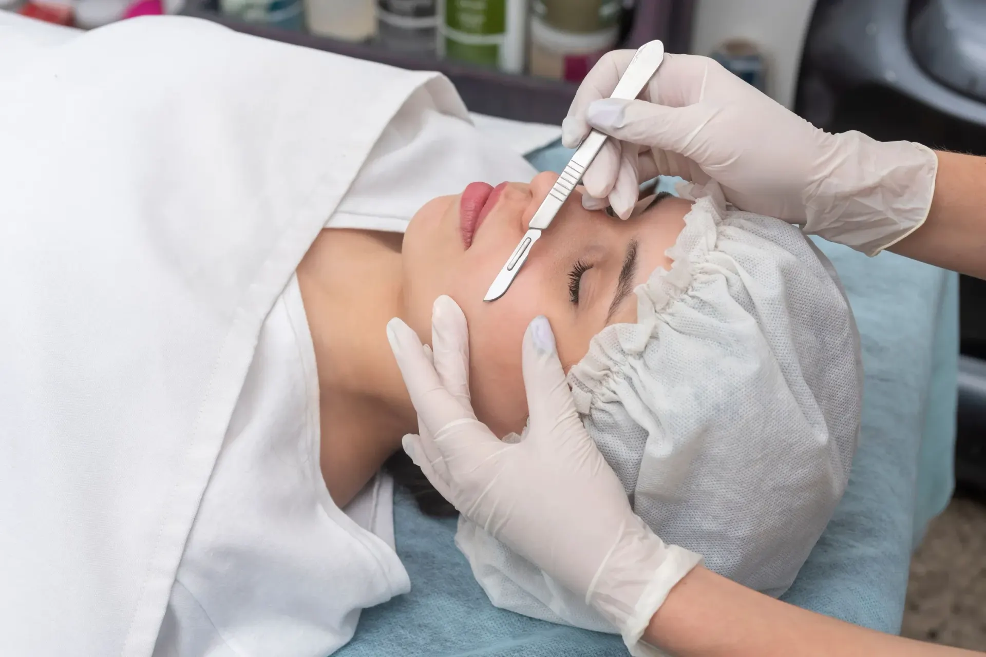 Patient receiving dermaplaning treatment at Pura Vida Med Spa in Fulton, Maryland
