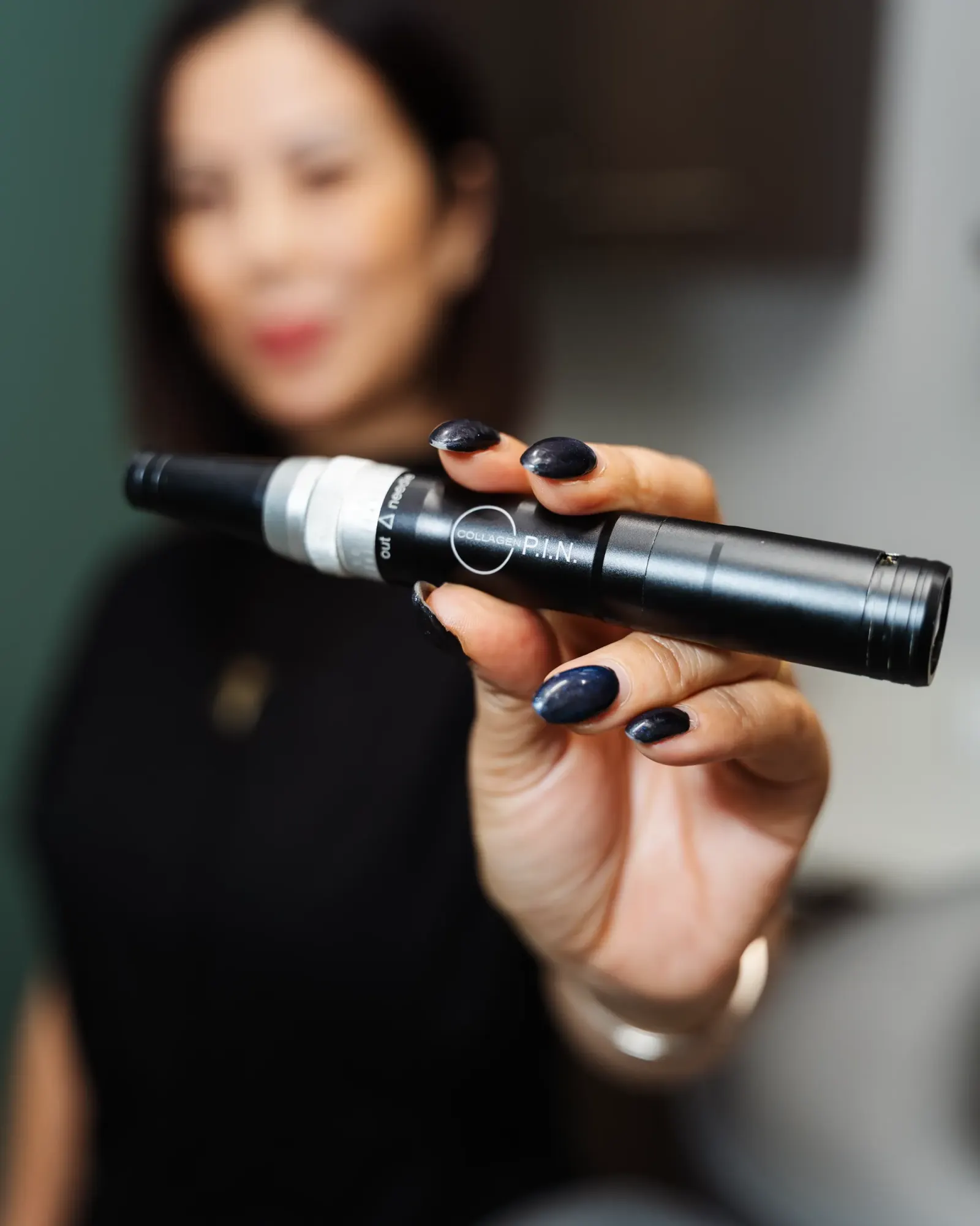 Provider explaining microneedling safety at Pura Vida Med Spa