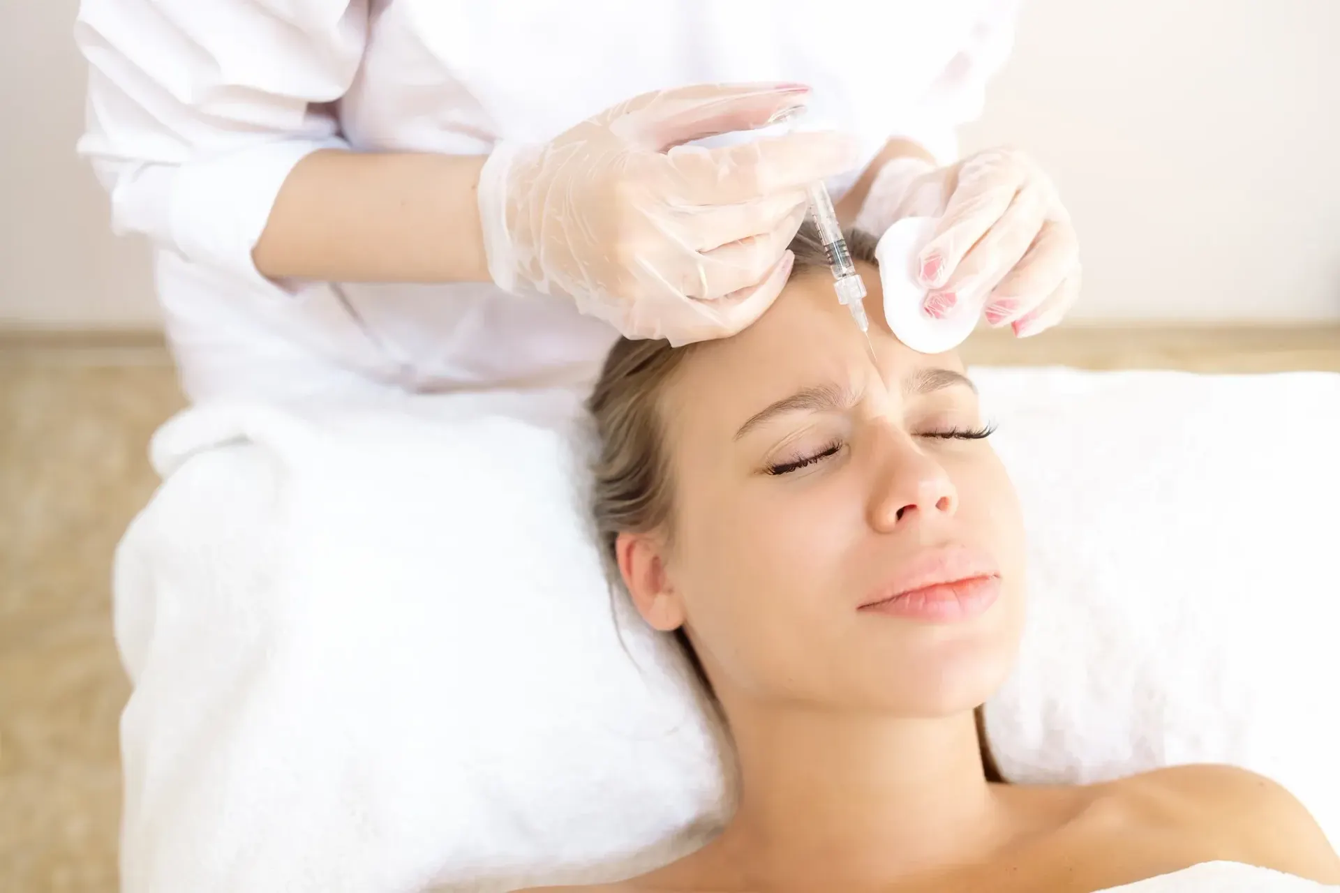 Patient receiving a precise neurotoxin injection at Pura Vida Med Spa in Maryland.